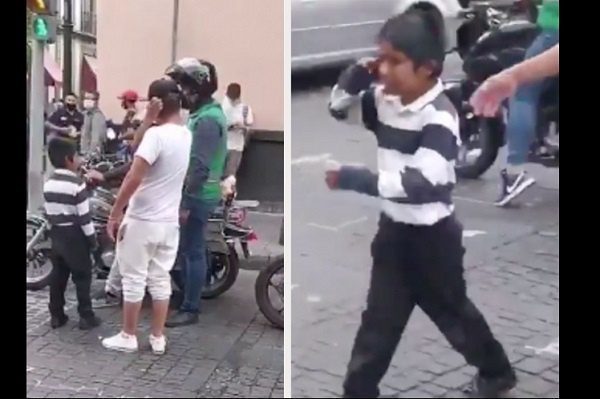 Exhiben a trabajador de la CDMX quitándole flores a niño vendedor #VIDEO