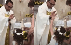 ¡Chócalas! hace niña a sacerdote cuando le da la bendición, y se viraliza #VIDEO