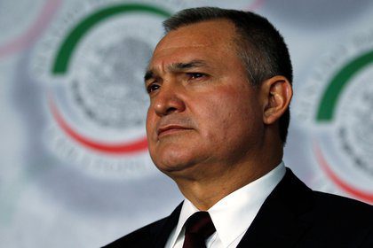 Cancelan audiencia de García Luna en NY, por interrupción de reporteros