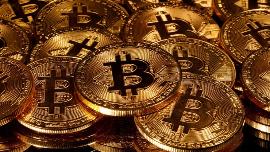 Bitcoin alcanza los 18 000 dólares, avanza capitalización de mercado