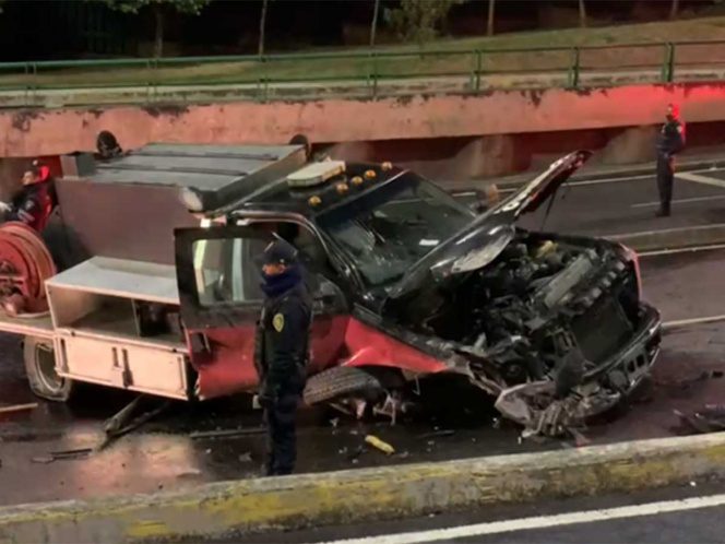 Tres bomberos heridos en aparatoso accidente causado por una coladera abierta