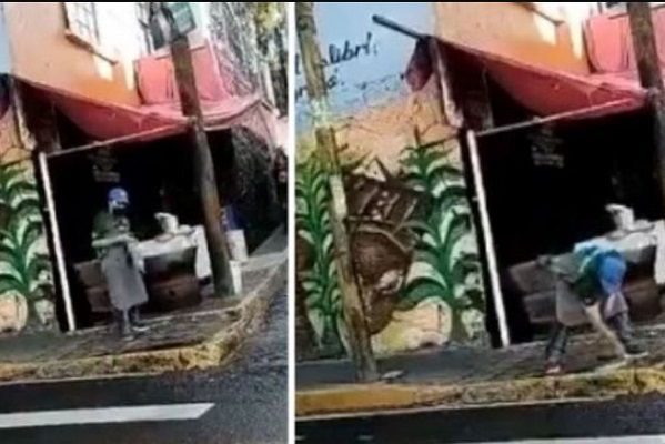 Captan a taquero lavando trapo con agua sucia de un charco #VIDEO