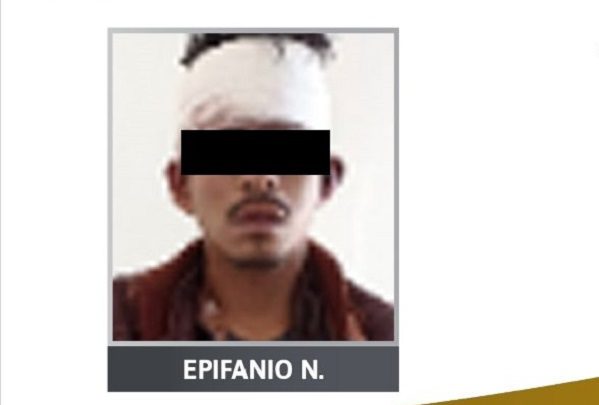 Procesan a hombre que se paseaba con una cabeza humana en Puebla