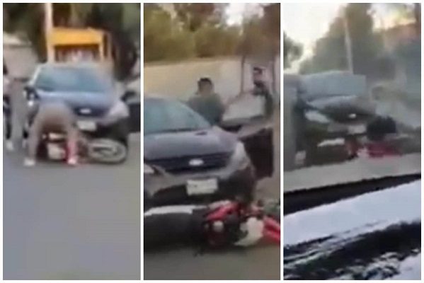 Tras choque, conductor arrastra motocicleta para tratar de huir #VIDEO