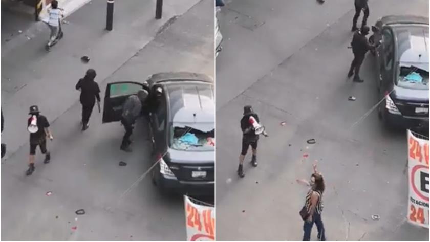 Encapuchadas vandalizan el auto de una mujer con ella a bordo