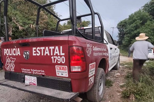 Caen 9 policías estatales por asesinato de tres habitantes de Coyomeapan, Puebla