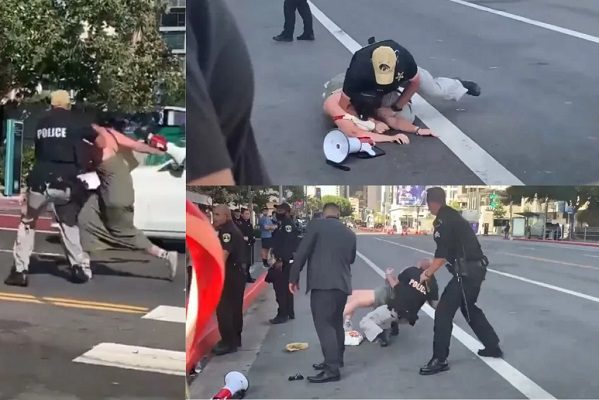 Policía taclea y somete a mujer que protestaba cerca del convoy del presidente Biden #VIDEO