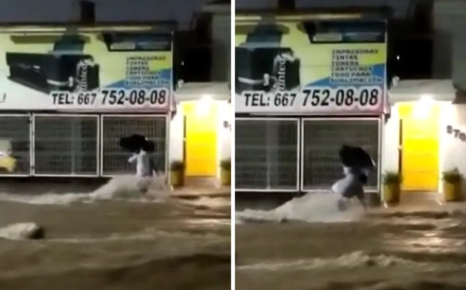 Mujer es arrastrada por la corriente al intentar cruz calle inundada en Culiacán #VIDEO