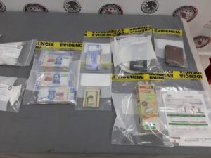 Decomisan 250 mil pesos, cocaína y armas en inmueble de Nuevo León