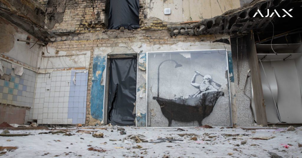 Mural de Banksy en Ucrania sobre un hombre tomando una ducha.