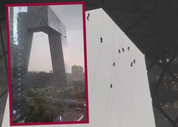 Trabajadores quedan suspendidos en el aire debido a fuertes vientos en China