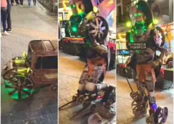 Artista callejero sorprende con traje de Transformer