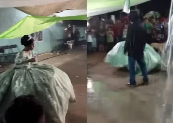 Quinceañera baila su vals bajo la lluvia